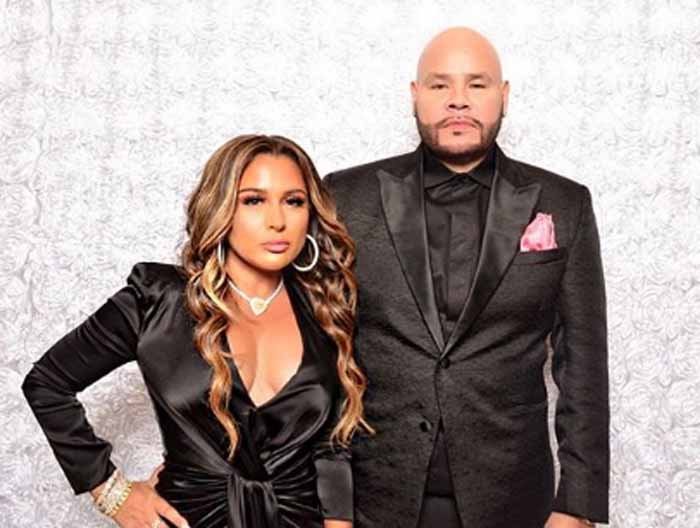 A picture of fat joe with his wife.